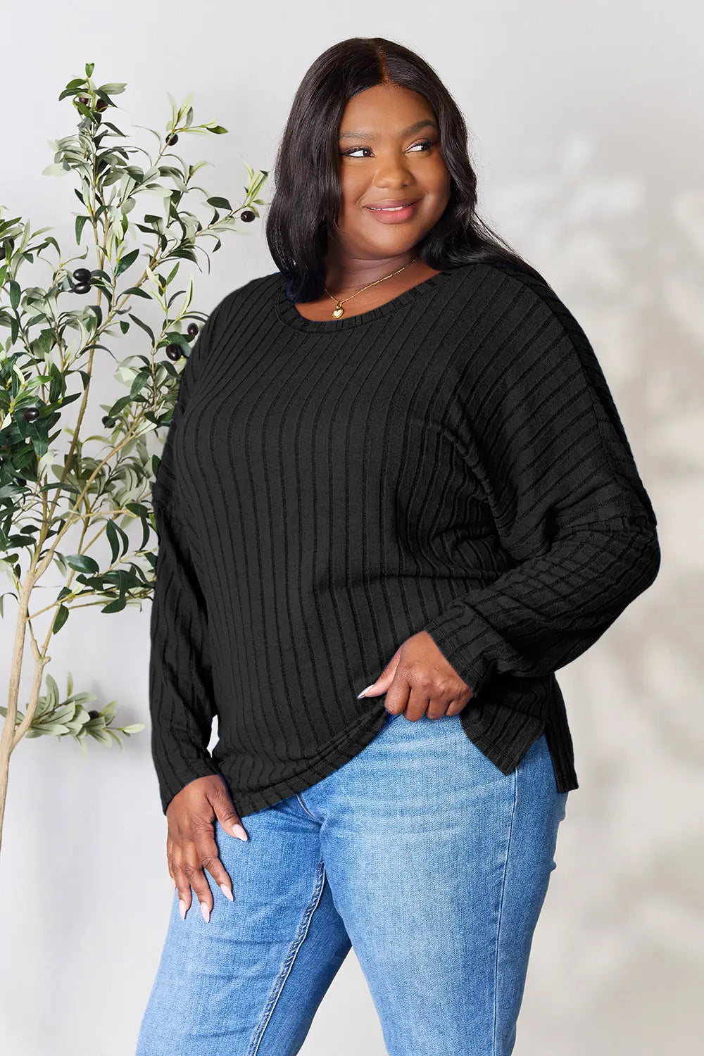 Trendsi plus size black ribbed knit long sleeve top paired with blue jeans