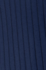 Close-up of navy blue ribbed knit fabric texture showing vertical lines and soft material